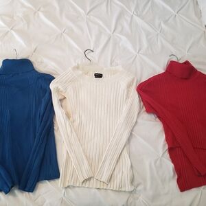 Three women sweaters.